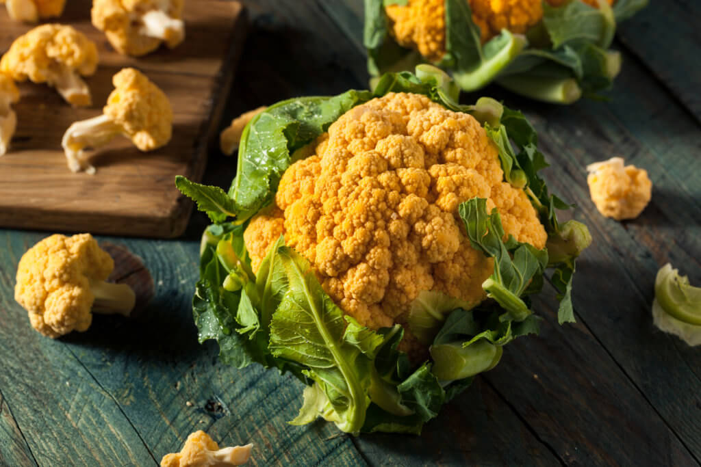 orange cauliflower on wood