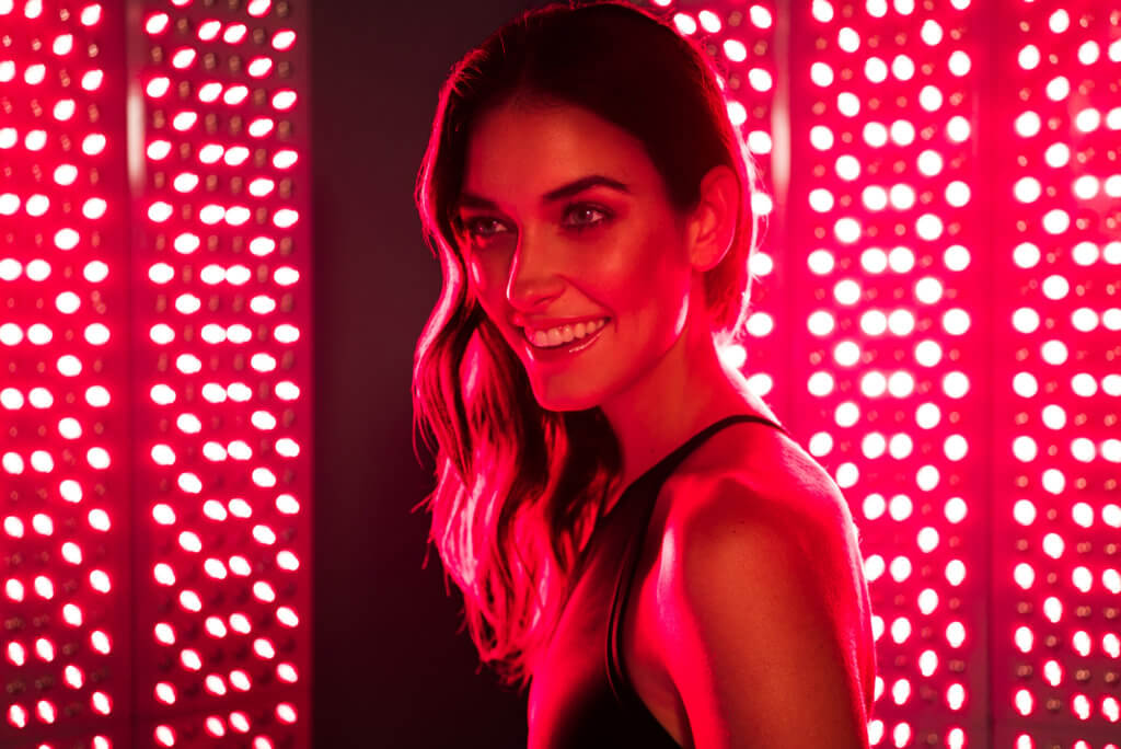 woman is treated with red light therapy
